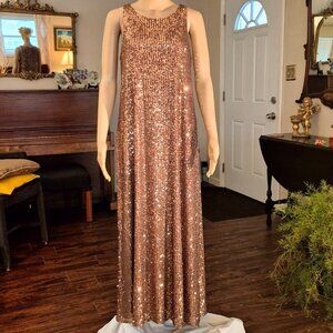 Formal gown, covered in sequins.Size Small. Full length.Fully lined.
